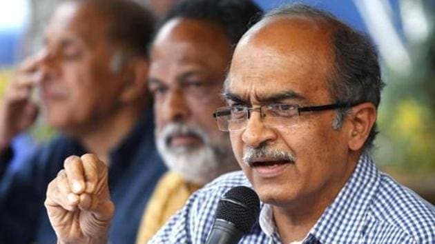 Prashant Bhushan told a bench, headed by Justice Arun Mishra, that he would consult his lawyers and think over the apex court’s suggestion. (HT PHOTO.) Prashant Bhushan told a bench, headed by Justice Arun Mishra, that he would consult his lawyers and think over the apex court’s suggestion. (HT PHOTO.)