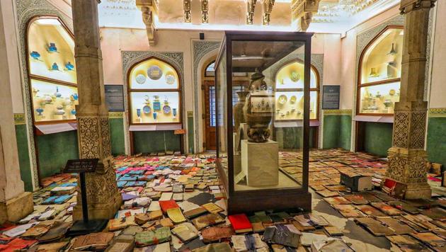 Jaipur: Documents of records kept for drying on a floor after rain water entered the historic Albert Hall museum, in Jaipur, Tuesday, Aug 18, 2020. The rain water entered the basement of the museum and an old mummy preserved in a box had to be taken out to a safe place.(PTI)