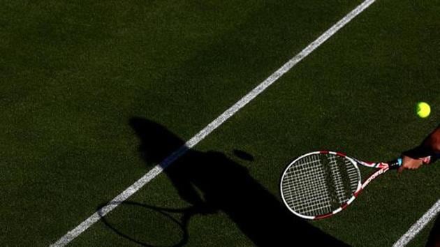 A generic shot of a tennis player's shadow during the match. (PA Images via Getty Images)