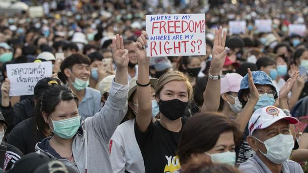 Anti-government protesters at a rally by the Democracy Monument in Bangkok on August 16. Education Minister Nataphol Teepsuwan said in a public address for the protesters, “I’m happy that they dare to speak out and that they are interested in politics at this age, as long as their ideas are beneficial to the country.” (Gemunu Amarasinghe / AP)