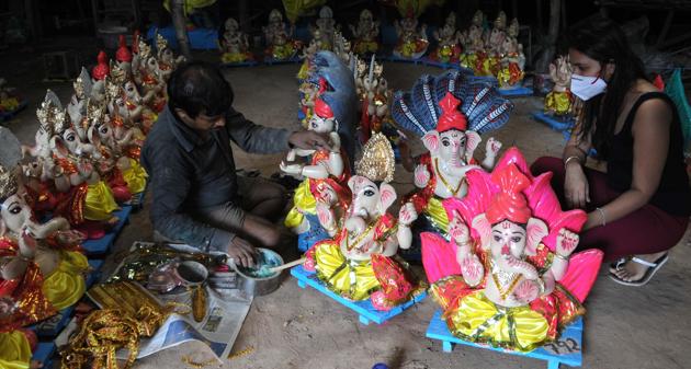 An artist works on an idol of Hindu deity Ganesh ahead of Ganesh Chaturthi festival at Shiv Temple Kalibari in Chandigarh, India, on Thursday, August 20, 2020. (Representational image )(Keshav Singh/Hindustan Times)