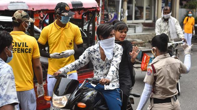 Civil Defence personnel stop people who were not wearing face masks and ask them to get tested for Covid-19 at Adarsh Nagar on August 20. The minister however, said the higher prevalence, which also indicates a larger proportion is now immune to the disease, does not mitigate the risks of resurgence. (Sanchit Khanna / HT Photo) Civil Defence personnel stop people who were not wearing face masks and ask them to get tested for Covid-19 at Adarsh Nagar on August 20. The minister however, said the higher prevalence, which also indicates a larger proportion is now immune to the disease, does not mitigate the risks of resurgence. (Sanchit Khanna / HT Photo)