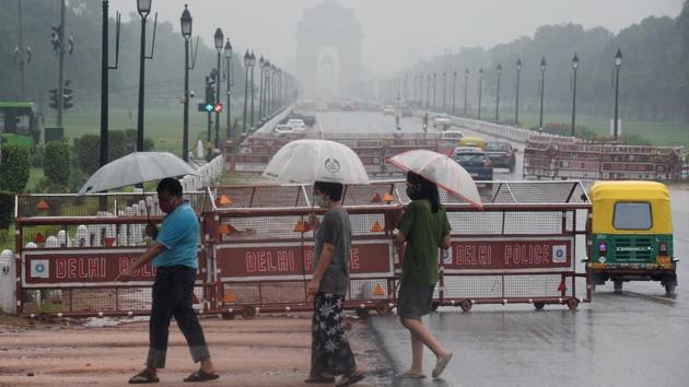 People by India Gate on a rainy August 19. “The people of Delhi are being very careful in taking precautions against Covid-19. So, this is a very positive development. It shows that the Covid-19 infection numbers are no longer rising exponentially in Delhi,” Jain said, while adding that the Capital “is heading towards herd immunity, but experts say that should be at least 40%”. (Sonu Mehta / HT Photo) People by India Gate on a rainy August 19. “The people of Delhi are being very careful in taking precautions against Covid-19. So, this is a very positive development. It shows that the Covid-19 infection numbers are no longer rising exponentially in Delhi,” Jain said, while adding that the Capital “is heading towards herd immunity, but experts say that should be at least 40%”. (Sonu Mehta / HT Photo)