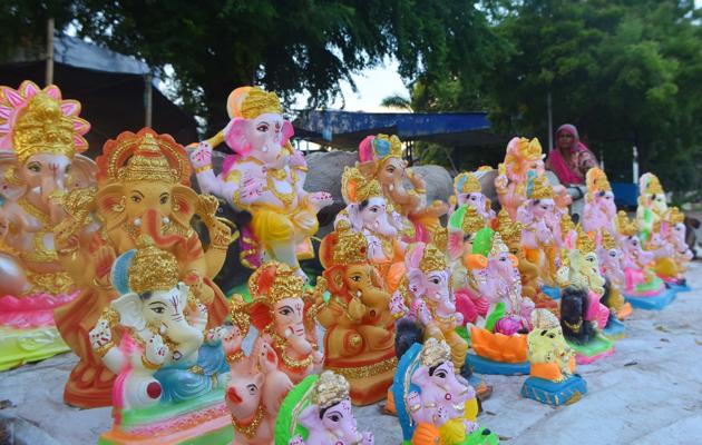 Patna, India - August 19, 2020: Idols of Hindu deity Ganesh displayed for sale ahead of Ganesh Chaturthi festival, at Bailey road in Patna, Bihar, India, on Wednesday, August 19 2020. (Photo by Parwaz Khan / Hindustan Times) Patna, India - August 19, 2020: Idols of Hindu deity Ganesh displayed for sale ahead of Ganesh Chaturthi festival, at Bailey road in Patna, Bihar, India, on Wednesday, August 19 2020. (Photo by Parwaz Khan / Hindustan Times)