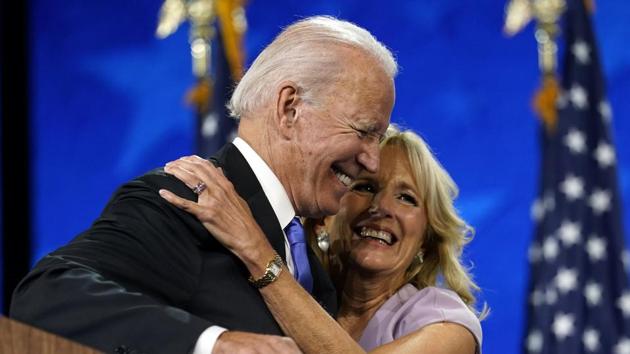 Democratic presidential candidate Joe Biden hugs his wife Jill Biden after his speech during the fourth day of the Democratic National Convention, Thursday, Aug. 20, 2020, at the Chase Center in Wilmington, Del.(AP Photo)