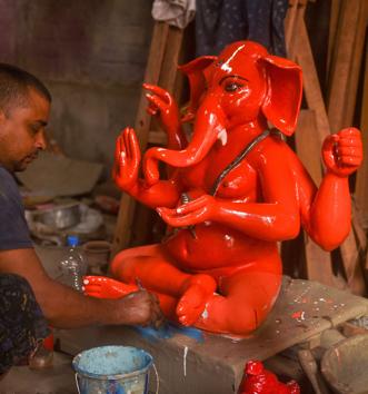 Kolkata: An artisan gives final touch to idols of Lord Ganesha on the eve of Ganesh Chaturthi festival, at Kumartuli in Kolkata, Friday, Aug. 21, 2020. (PTI Photo/Ashok Bhaumik)(PTI21-08-2020_000044A) (PTI) Kolkata: An artisan gives final touch to idols of Lord Ganesha on the eve of Ganesh Chaturthi festival, at Kumartuli in Kolkata, Friday, Aug. 21, 2020. (PTI Photo/Ashok Bhaumik)(PTI21-08-2020_000044A) (PTI)