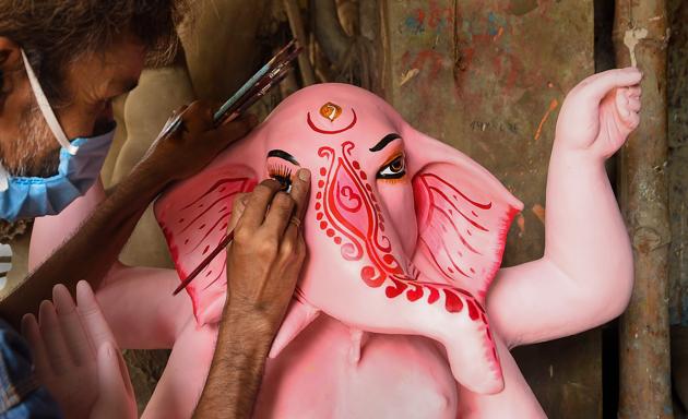 Kolkata: An artisan makes an idol of Lord Ganesh ahead of the Ganesh Chaturthi festival, in Kolkata, Wednesday, Aug. 19, 2020. (PTI Photo/Ashok Bhaumik)(PTI19-08-2020_000099B) (PTI) Kolkata: An artisan makes an idol of Lord Ganesh ahead of the Ganesh Chaturthi festival, in Kolkata, Wednesday, Aug. 19, 2020. (PTI Photo/Ashok Bhaumik)(PTI19-08-2020_000099B) (PTI)