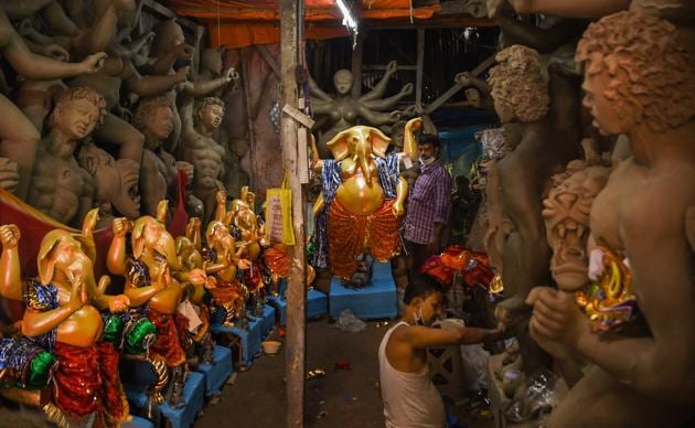 Kolkata: An artisan makes an idol of Lord Ganesh ahead of the Ganesh Chaturthi festival, in Kolkata, Wednesday, Aug. 19, 2020. (PTI Photo/Ashok Bhaumik)(PTI19-08-2020_000096A) (PTI) Kolkata: An artisan makes an idol of Lord Ganesh ahead of the Ganesh Chaturthi festival, in Kolkata, Wednesday, Aug. 19, 2020. (PTI Photo/Ashok Bhaumik)(PTI19-08-2020_000096A) (PTI)