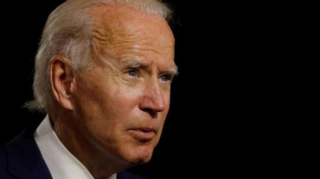 Joe Biden’s positive focus Thursday night marked a break from the dire warnings offered by former President Obama and others the night before (REUTERS) Joe Biden’s positive focus Thursday night marked a break from the dire warnings offered by former President Obama and others the night before (REUTERS)