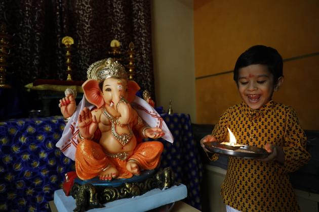 A little child looks on in excitement on the ocassion of Ganesh Chaturthi in his home on August 22, 2020 in Pune, Maharashtra. (Rahul Raut/HT Photo) A little child looks on in excitement on the ocassion of Ganesh Chaturthi in his home on August 22, 2020 in Pune, Maharashtra. (Rahul Raut/HT Photo)