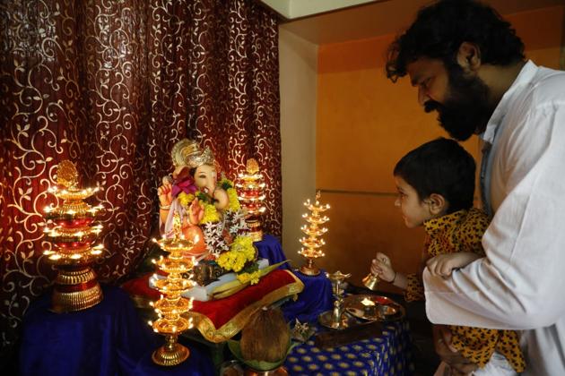 Puneites welcomed Lord Ganesha in their homes on Ganesh Chathurthi at Bibwewadi, Pune, Maharashtra on August 22, 2020. (Rahul Raut/HT Photo) Puneites welcomed Lord Ganesha in their homes on Ganesh Chathurthi at Bibwewadi, Pune, Maharashtra on August 22, 2020. (Rahul Raut/HT Photo)