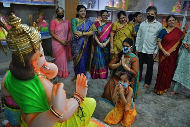 Thane: Lord Ganesha idols arrived in homes across Maharashtra on Saturday amid the coronavirus pandemic. People have decided to celebrate Ganpati by following safety guidelines. (Praful Gangurde/HT photo) Thane: Lord Ganesha idols arrived in homes across Maharashtra on Saturday amid the coronavirus pandemic. People have decided to celebrate Ganpati by following safety guidelines. (Praful Gangurde/HT photo)