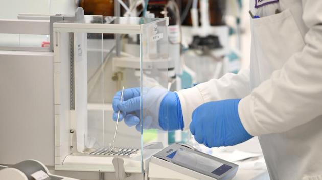 A chemist works at AstraZeneca's headquarters.(Reuters File Photo)