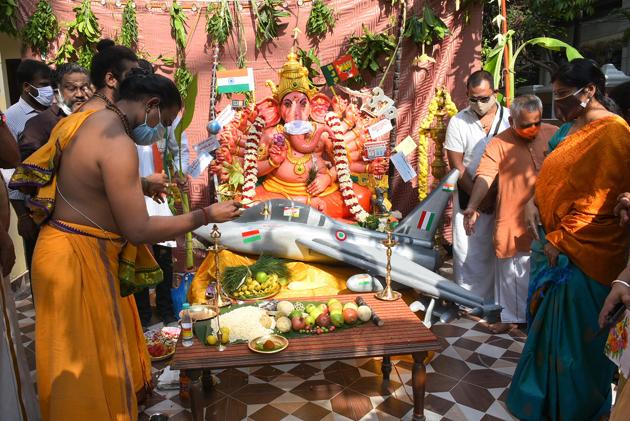 Chennai: Priests and devotees offer prayers at state BJP office, on the occasion of Ganesh Chaturthi festival, in Chennai, Saturday, Aug. 22, 2020. The state government decided not to allow the installation of Lord Ganesh idols in public places and processions or their immersion in water bodies following the coronavirus outbreak. (PTI) Chennai: Priests and devotees offer prayers at state BJP office, on the occasion of Ganesh Chaturthi festival, in Chennai, Saturday, Aug. 22, 2020. The state government decided not to allow the installation of Lord Ganesh idols in public places and processions or their immersion in water bodies following the coronavirus outbreak. (PTI)