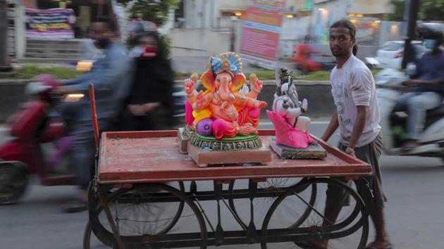 Many Ganpati mandals in the city voluntarily decided to contain Ganesh festivities this year, keeping in mind the current Covid-19 situation in the city and state.(AP) Many Ganpati mandals in the city voluntarily decided to contain Ganesh festivities this year, keeping in mind the current Covid-19 situation in the city and state.(AP)