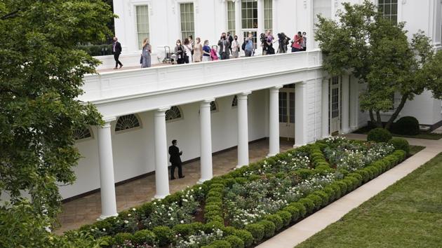 Journalists get an overhead view of the restored Rose Garden at the White House in Washington, Saturday, Aug. 22, 2020. First Lady Melania Trump will deliver her Republican National Convention speech Tuesday night from the garden, famous for its close proximity to the Oval Office. (AP Photo/Susan Walsh)