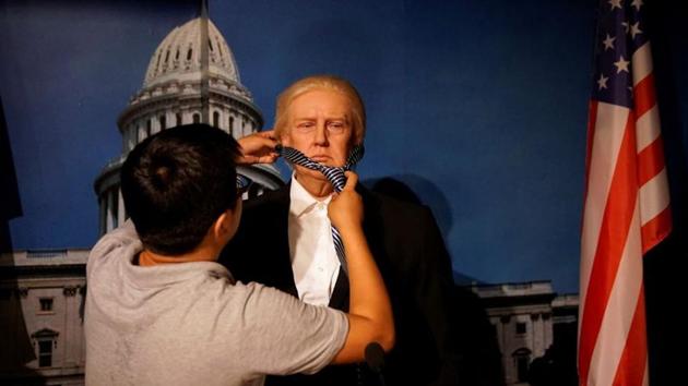 A technician demonstrates for the camera the assembling of a wax figure of U.S. President Donald Trump at a wax museum of Shanghai Maiyi Arts, following the global outbreak of the coronavirus disease (COVID-19), in Shanghai, China August 21, 2020. (REUTERS/Aly Song) A technician demonstrates for the camera the assembling of a wax figure of U.S. President Donald Trump at a wax museum of Shanghai Maiyi Arts, following the global outbreak of the coronavirus disease (COVID-19), in Shanghai, China August 21, 2020. (REUTERS/Aly Song)