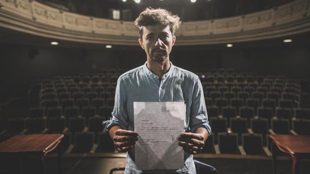 Mihail Zui, 39, an actor of the Yanka Kupala National Theatre poses for a photo showing his resignation letter in Minsk on August 18. After the theatre’s director decided to support the protesters against President Alexander Lukashenko’s 26-year rule, he was fired — and Zui and most of the other performers quit in solidarity and anger. (Evgeniy Maloletka / AP) Mihail Zui, 39, an actor of the Yanka Kupala National Theatre poses for a photo showing his resignation letter in Minsk on August 18. After the theatre’s director decided to support the protesters against President Alexander Lukashenko’s 26-year rule, he was fired — and Zui and most of the other performers quit in solidarity and anger. (Evgeniy Maloletka / AP)