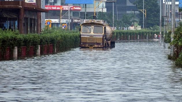 A waterlogged Parvat gam road in Surat, Gujarat.(ANI) A waterlogged Parvat gam road in Surat, Gujarat.(ANI)