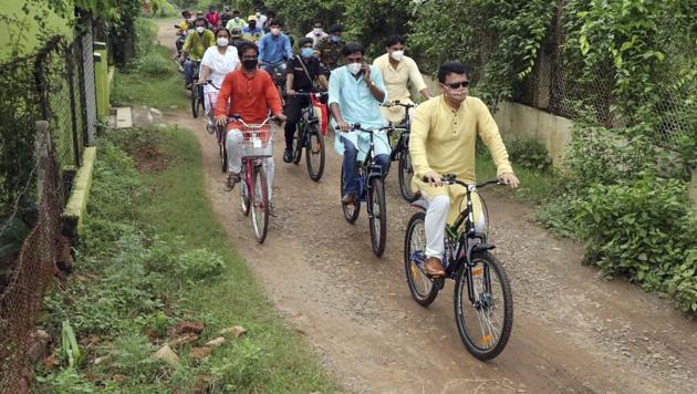 Superintendent of Police Shyam Singh along with other police official ride on bicycles inspecting the Visva-Bharati University area, in Bengal’s Birbhum on Sunday.(PTI) Superintendent of Police Shyam Singh along with other police official ride on bicycles inspecting the Visva-Bharati University area, in Bengal’s Birbhum on Sunday.(PTI)