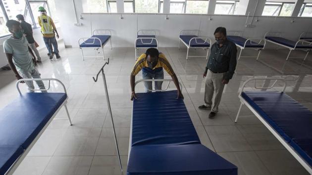 Work in progress at a 314 bed Covid Care Center at Baner in Pune on August 24. The widening gap has led to active cases becoming about 22.24% of the total positive case reported in the country so far. The first case was diagnosed positive on January 30, this year. The Covid-19 recoveries have also touched 75% (75.92%) as of August 25. (Pratham Gokhale / HT Photo) Work in progress at a 314 bed Covid Care Center at Baner in Pune on August 24. The widening gap has led to active cases becoming about 22.24% of the total positive case reported in the country so far. The first case was diagnosed positive on January 30, this year. The Covid-19 recoveries have also touched 75% (75.92%) as of August 25. (Pratham Gokhale / HT Photo)