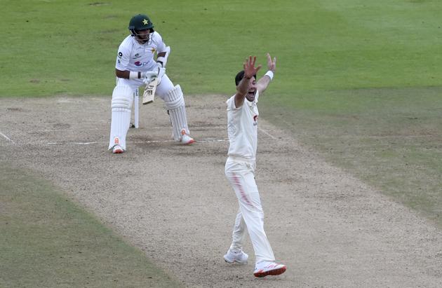 England's James Anderson, right, appeals successfully for the wicket of Pakistan's Abid Ali, left, during the fourth day of the third cricket Test match between England and Pakistan, at the Ageas Bowl in Southampton, England, Monday, Aug. 24, 2020. (Mike Hewitt/Pool via AP) (AP)