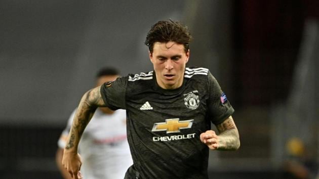 Soccer Football - Europa League Semi Final - Sevilla v Manchester United - RheinEnergieSTADION, Cologne, Germany - August 16, 2020 Manchester United's Victor Lindelof in action, as play resumes behind closed doors following the outbreak of the coronavirus disease (COVID-19) Ina Fassbender/Pool via REUTERS(REUTERS)