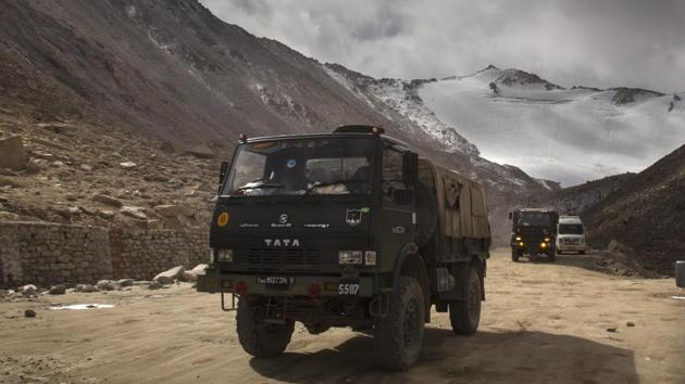 Indian Army vehicles drive on a road in Ladakh region near the border with China(AP)