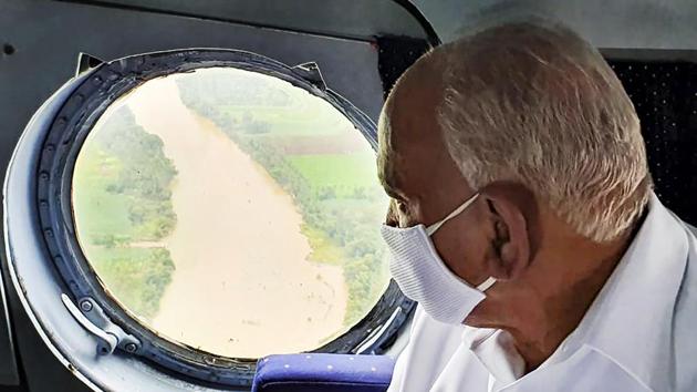 Chief minister BS Yediyurappa conducting aerial survey of the flood affected areas in North Karnataka on Tuesday. (PTI File photo)