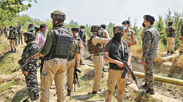 Security forces inspect the site of a terrorist attack in J&K’s Baramulla. Security forces inspect the site of a terrorist attack in J&K’s Baramulla.