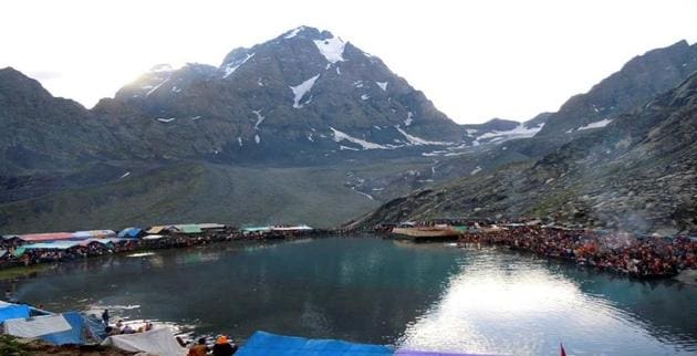 Manimahesh Lake with Mount Kailash in the backdrop. Manimahesh Yatra, which began on August 12, was held symbolically this year due to the Covid-19 outbreak. Pilgrims trek to the oval-shaped lake at a height of 13,500ft to catch a glimpse of Mount Kailash, the abode of Lord Shiva, and offer prayers.(Ht file photo)