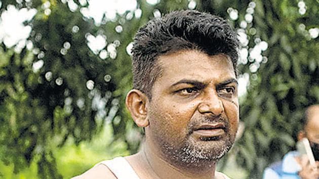 Mujahid Shaikh raised an alert when he saw the building’s pillars shaking.(Pratham Gokhale/HT Photo)