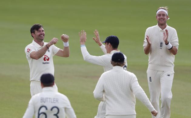 England's James Anderson, left, celebrates with teammates his 600th test wicket after dismissing Pakistan's captain Azhar Ali during the fifth day of the third cricket Test match between England and Pakistan, at the Ageas Bowl in Southampton, England, Tuesday, Aug. 25, 2020. (AP Photo/Alastair Grant, Pool) (AP)