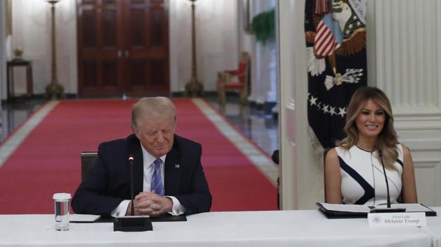 President Donald Trump and first lady Melania Trump at a "National Dialogue on Safely Reopening America's Schools," event in July. (AP File Photo) President Donald Trump and first lady Melania Trump at a "National Dialogue on Safely Reopening America's Schools," event in July. (AP File Photo)