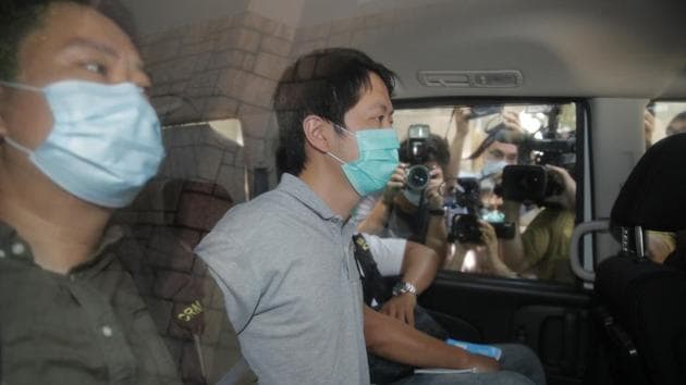 A police source told AFP that 16 people -- including Lam and Hui -- were arrested during Wednesday’s operation, which focused on protests in July last year.(AP Photo)