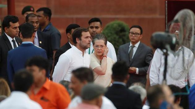 Congress party leader Rahul Gandhi and his mother and party president Sonia Gandhi arrive to attend Prime Minister Narendra Modi's swearing-in ceremony at the presidential palace in New Delhi.(REUTERS)