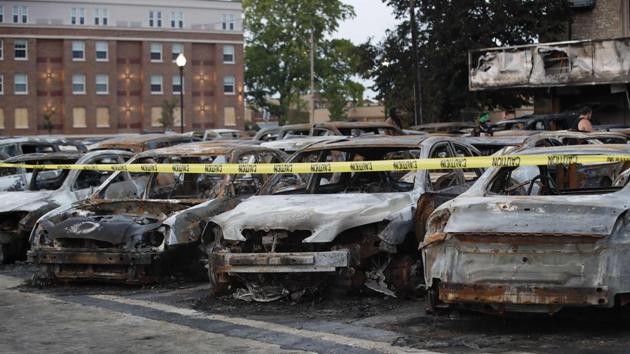 The remains of cars burned during previous day’s protest are seen in Kenosha, Wisconsin on August 24. As the protests devolved into unrest, the crowds destroyed dozens of buildings and set more than 30 fires in the city’s downtown, AP reported. (Kamil Krzaczynski / AFP) The remains of cars burned during previous day’s protest are seen in Kenosha, Wisconsin on August 24. As the protests devolved into unrest, the crowds destroyed dozens of buildings and set more than 30 fires in the city’s downtown, AP reported. (Kamil Krzaczynski / AFP)