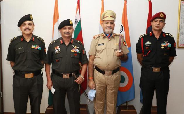 (From left) Deputy director general brigadier JS Samyal , Punjab, Haryana, Himachal and Chandigarh Directorate NCC additional director general major general Beji Mathews, Panjab University vice-chancellor Dr Raj Kumar and NCC group commander brigadier Harsh Chhibber at the NCC Group Headquarters in Chandigarh on Thursday.(HT Photo)