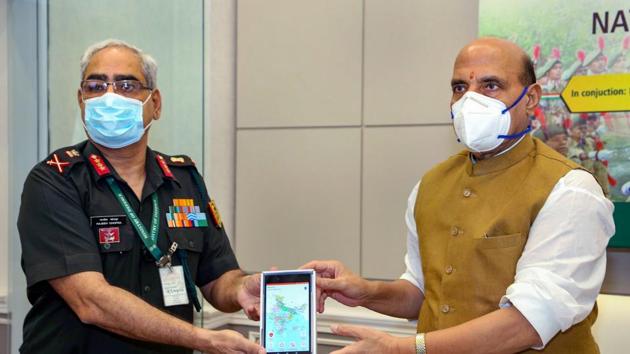 Rajnath Singh with NCC DG Lt General Rajeev Chopra during the launch of mobile training app for NCC cadets, in New Delhi on Thursday.(PTI)