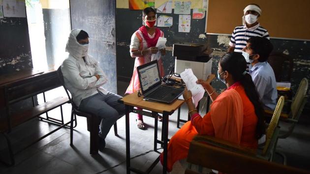 Workers register with the Delhi Building and Other Construction Workers Welfare Board at a registration camp in Model Town on August 25. In statements offered separately, the chief minister’s office said the increase in cases was a “momentary situation” that does not, at the moment, require putting curbs on the economic activities that have been allowed, and the government still believes the Delhi Metro must be restarted. (Sanchit Khanna / HT Photo) Workers register with the Delhi Building and Other Construction Workers Welfare Board at a registration camp in Model Town on August 25. In statements offered separately, the chief minister’s office said the increase in cases was a “momentary situation” that does not, at the moment, require putting curbs on the economic activities that have been allowed, and the government still believes the Delhi Metro must be restarted. (Sanchit Khanna / HT Photo)