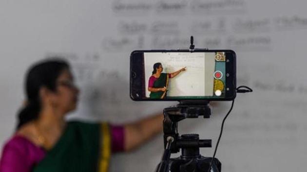 A school teacher gives a live streaming online class in Chennai.(AFP)