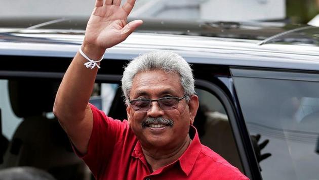 Sri Lanka's President Gotabaya Rajapaksa waves at his supporters as he leaves a polling station after casting his vote during the country's parliamentary election in Colombo, Sri Lanka.(REUTERS)