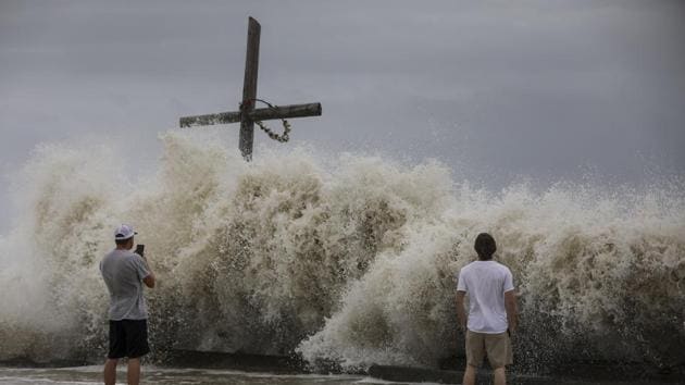 Waves crash ashore as outer bands from Hurricane Laura begin to hit the coast Wednesday. (AP Photo) Waves crash ashore as outer bands from Hurricane Laura begin to hit the coast Wednesday. (AP Photo)