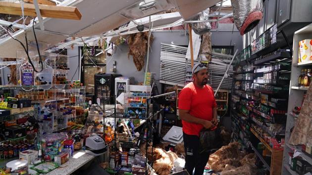 Ahmed Nawaz looks through the damage to his store after Hurricane Laura passed through Lake Charles, Louisiana on August 27. Laura caused less mayhem than forecasts predicted - but officials said it remained a dangerous storm and that it would take days to assess the damage. At least 867,000 homes and businesses in Louisiana, Texas and Arkansas were hit by power cuts. (Elijah Nouvelage / REUTERS) Ahmed Nawaz looks through the damage to his store after Hurricane Laura passed through Lake Charles, Louisiana on August 27. Laura caused less mayhem than forecasts predicted - but officials said it remained a dangerous storm and that it would take days to assess the damage. At least 867,000 homes and businesses in Louisiana, Texas and Arkansas were hit by power cuts. (Elijah Nouvelage / REUTERS)