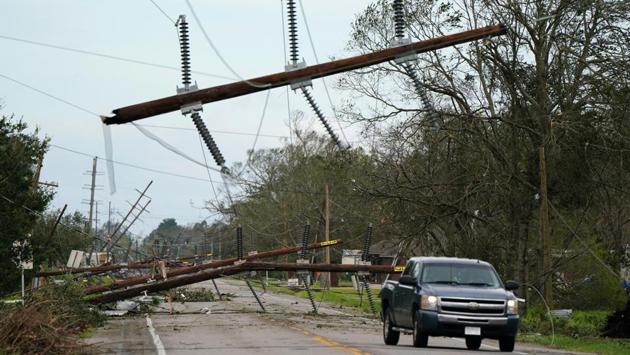 Downed power lines are seen on Highway 90 after Hurricane Laura passed through Iowa, Louisiana on August 27. “This was the most powerful storm to ever make landfall in Louisiana,” Reuters quoted Governor John Bel Edwards telling a news conference. “It’s continuing to cause damage and life-threatening conditions,” he said. (Elijah Nouvelage / REUTERS) Downed power lines are seen on Highway 90 after Hurricane Laura passed through Iowa, Louisiana on August 27. “This was the most powerful storm to ever make landfall in Louisiana,” Reuters quoted Governor John Bel Edwards telling a news conference. “It’s continuing to cause damage and life-threatening conditions,” he said. (Elijah Nouvelage / REUTERS)