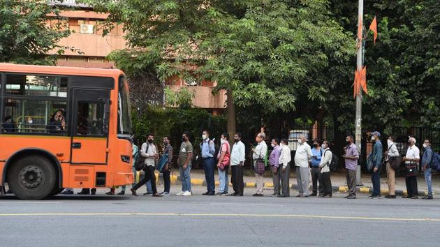 Commuters queue to board a DTC bus at Pandit Pant Marg in New Delhi on August 26. The rise in recoveries from Covid-19 to 2.6 million has also taken the country’s recovery rate from the disease to 76.47%. (Arvind Yadav / HT Photo) Commuters queue to board a DTC bus at Pandit Pant Marg in New Delhi on August 26. The rise in recoveries from Covid-19 to 2.6 million has also taken the country’s recovery rate from the disease to 76.47%. (Arvind Yadav / HT Photo)