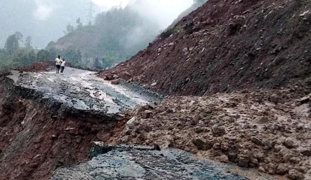 Jammu-Srinagar NH44 blocked due to a landslide, at Dalwas, near Nashri Tunnel in Ramban district.(ANI)