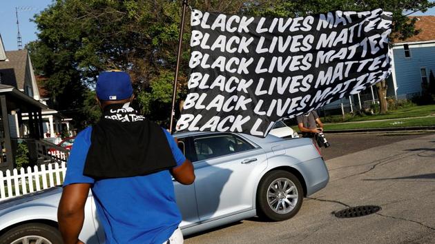 The protests started after Jacob Blake was shot multiple times in the back by a police officer on Sunday afternoon.(Reuters)