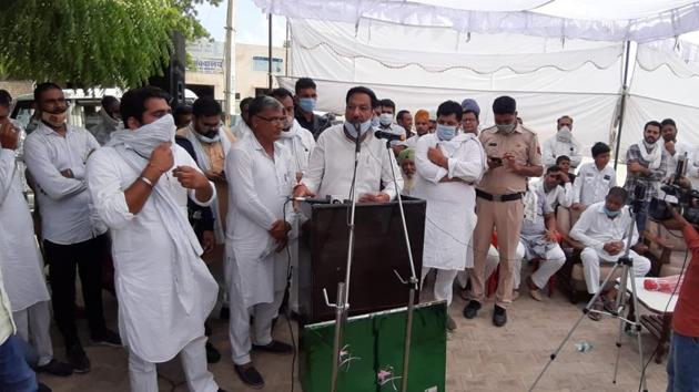 Haryana power minister Ranjit Singh Chautala campaigning in the Baroda assembly constituency in Sonepat district before he tested positive for Covid-19.(HT Photo)