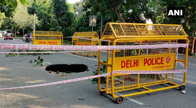 Visuals of Shrimant Madhav Rao Scindia Marg in Delhi after it caved in on Saturday. (Photo: ANI) Visuals of Shrimant Madhav Rao Scindia Marg in Delhi after it caved in on Saturday. (Photo: ANI)